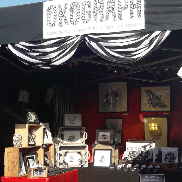 Photo du stand d'exposition de l'artiste Okograph au Festival Elsass Rock And Jive en 2018
